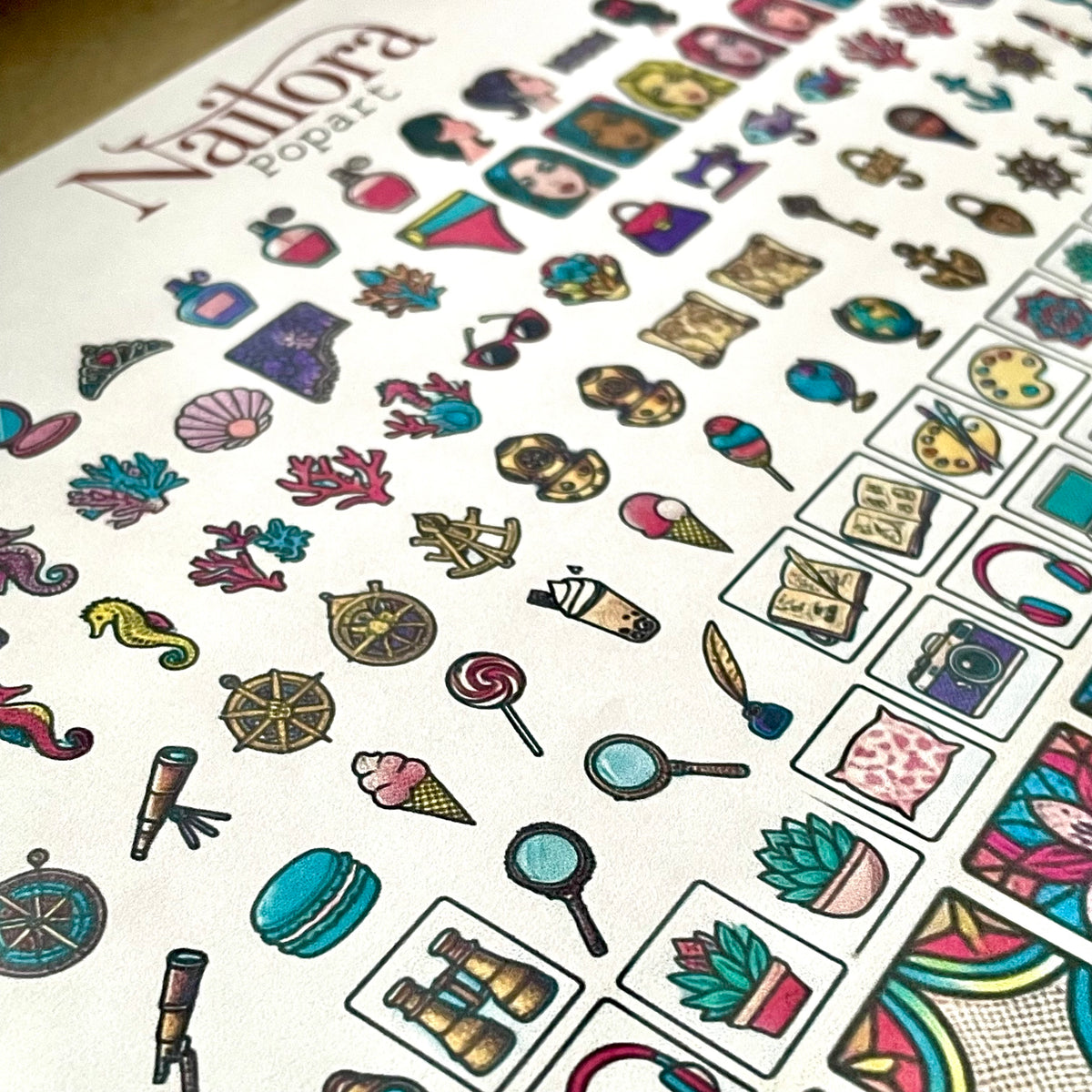 DIY nail art decal sheet by nailora, sheets is a fun colourfil white sheet filled with popartdesigns