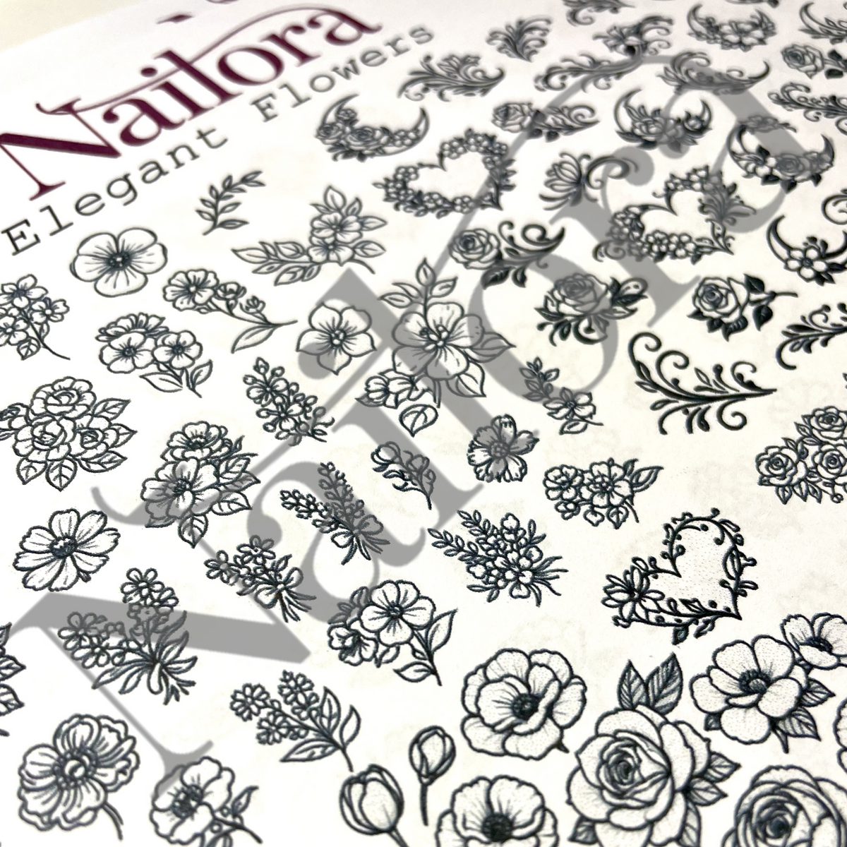 Nailora Elegant Flowers sheet 2 clear stamp sheet featuring black line-art illustrations of various flowers, leaves, and decorative floral motifs on a white background.