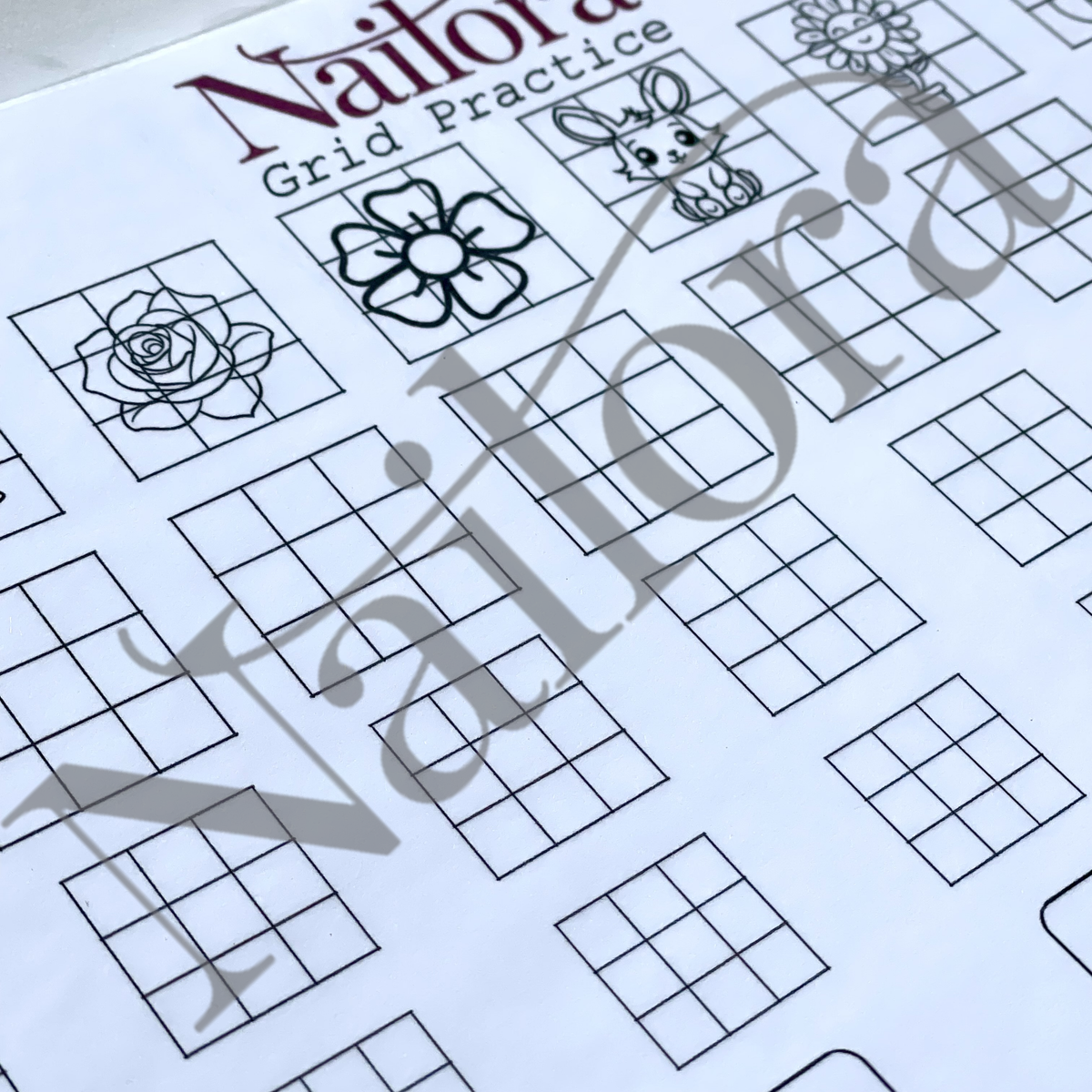 A close-up of a nail art grid practice sheet from Nailora, featuring black line-art floral and bunny motifs over white grids, with a large translucent Nailora watermark across the page. digital download
