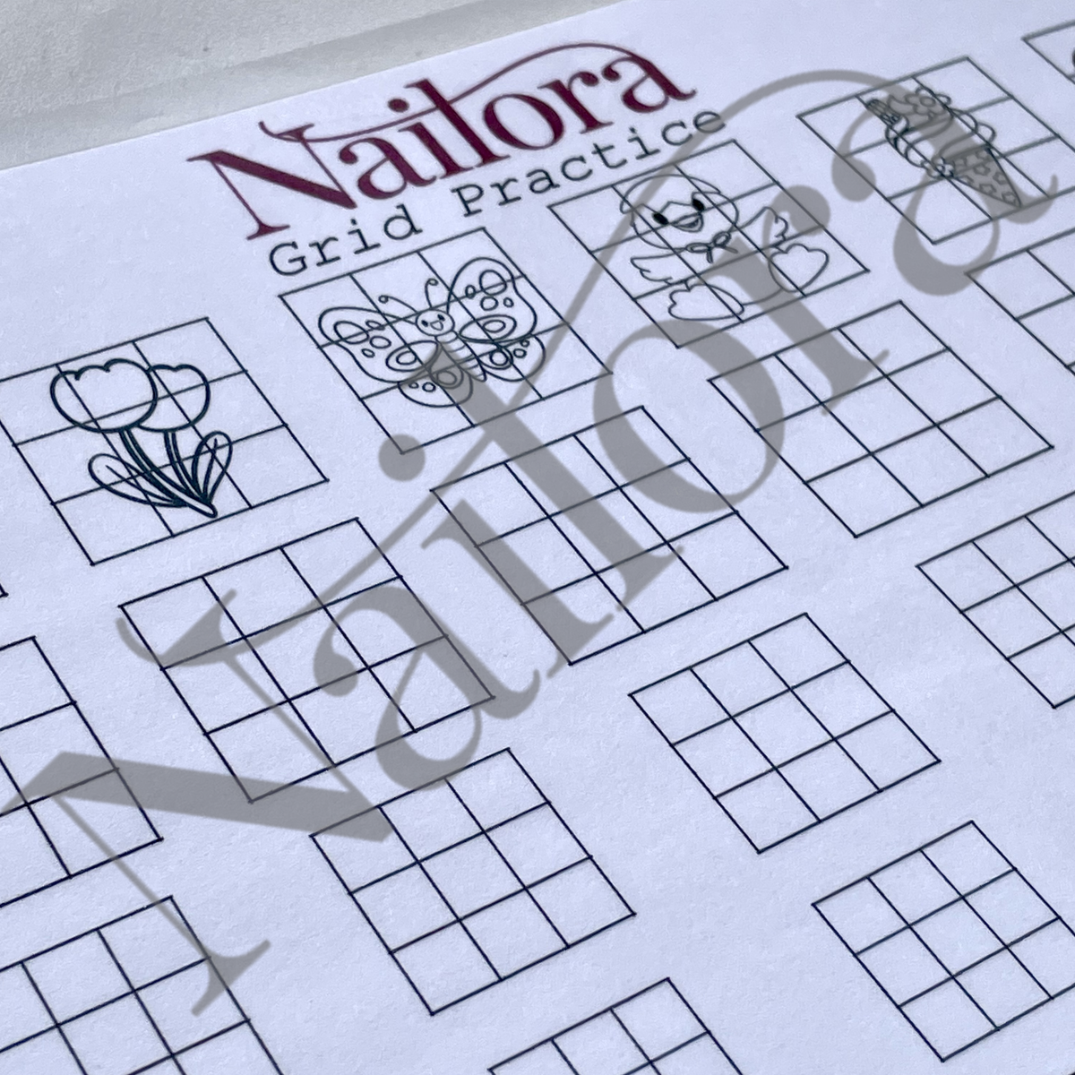 A close-up of a printed Nailora Grid nail art Practice sheet, showing black grid boxes and small outlined floral and butterfly motifs on white paper, with a large translucent Nailora watermark across the page.