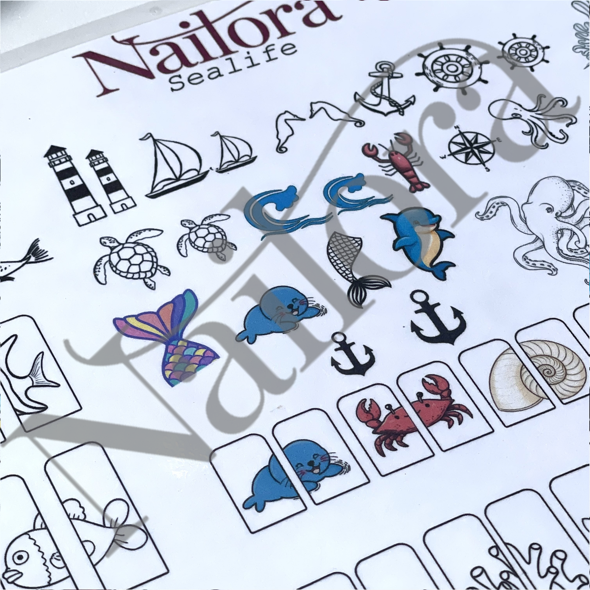 A close-up of a nail art traceable sheet featuring various nautical and sea life designs, including dolphins, a lobster, a turtle, a crab, a lighthouse, anchors, a ship's wheel, a nautilus shell, and a seahorse. The sheet has a white background with black outlines and several colorful illustrations in blue, purple, and red.